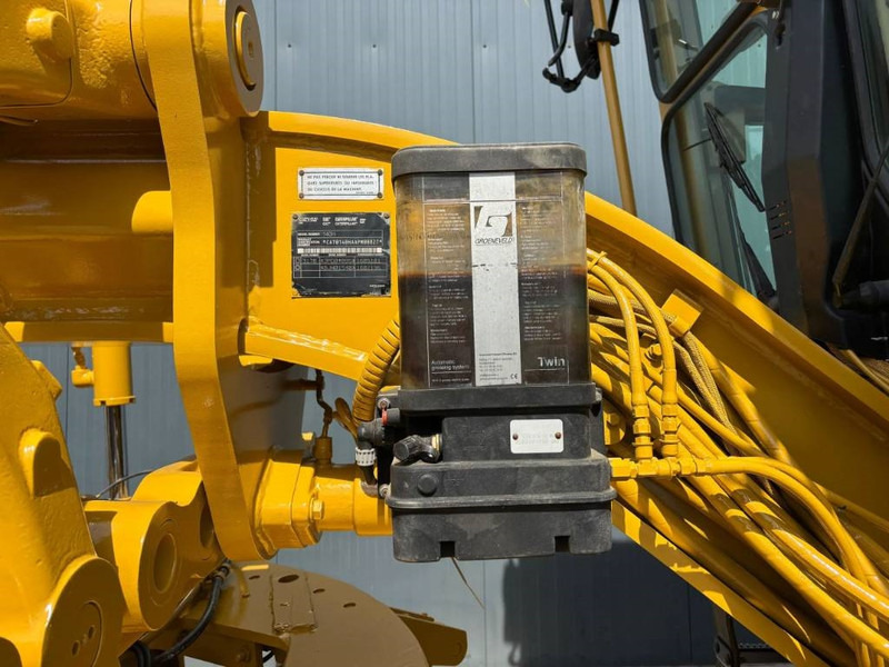 Gréder Cat 140H: 7 kép.