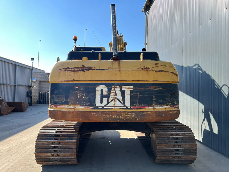 Cat 320C L - Lánctalpas kotró: 4 kép. Cat 320C L - Lánctalpas kotró: 4 kép.