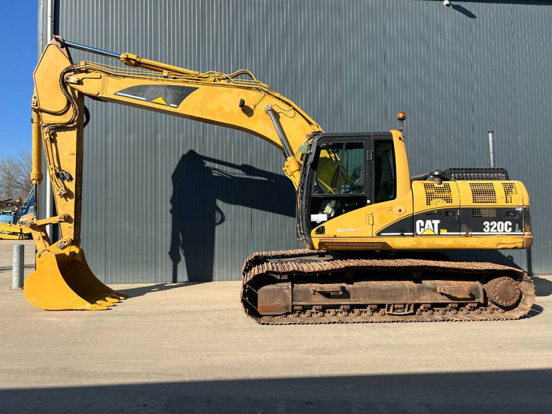Cat 320C L - Lánctalpas kotró: 2 kép. Cat 320C L - Lánctalpas kotró: 2 kép.
