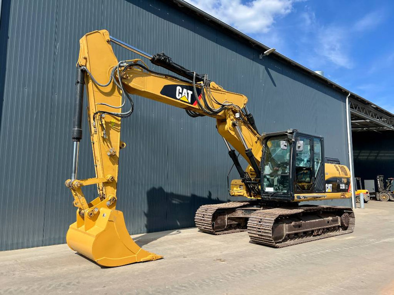 Cat 323D LN VA - Lánctalpas kotró: 1 kép. Cat 323D LN VA - Lánctalpas kotró: 1 kép.