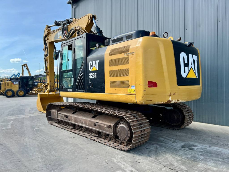 Cat 323EL VA - Lánctalpas kotró: 3 kép. Cat 323EL VA - Lánctalpas kotró: 3 kép.