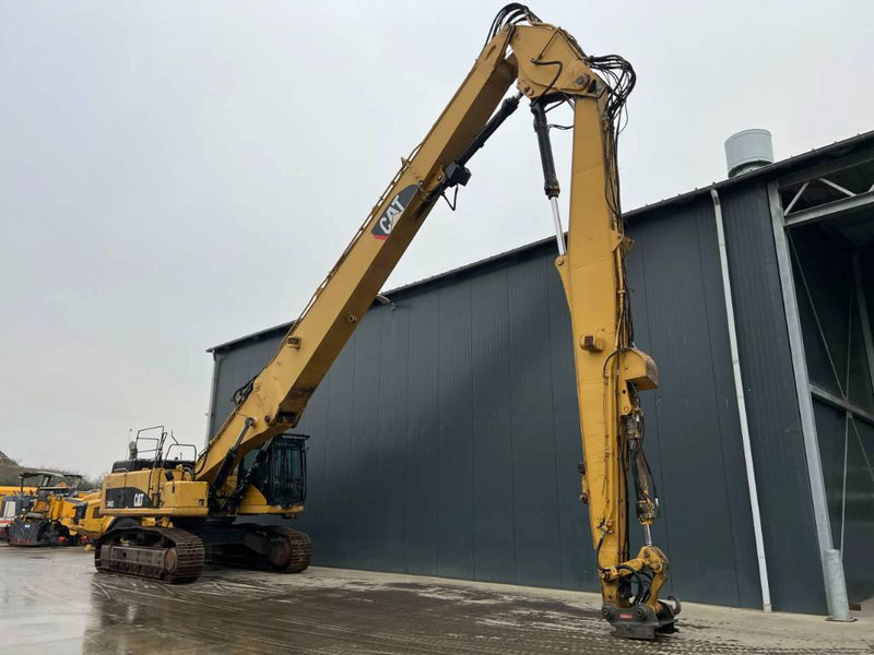 Cat 345C L UHD - 27m - OilQuick - Lánctalpas kotró: 2 kép. Cat 345C L UHD - 27m - OilQuick - Lánctalpas kotró: 2 kép.