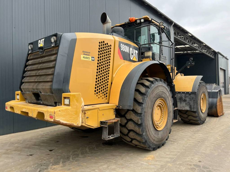 Cat 980M - Gumikerekes homlokrakodó: 4 kép. Cat 980M - Gumikerekes homlokrakodó: 4 kép.