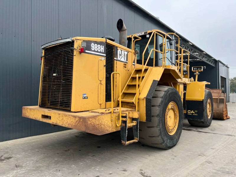 Cat 988H - Gumikerekes homlokrakodó: 4 kép. Cat 988H - Gumikerekes homlokrakodó: 4 kép.