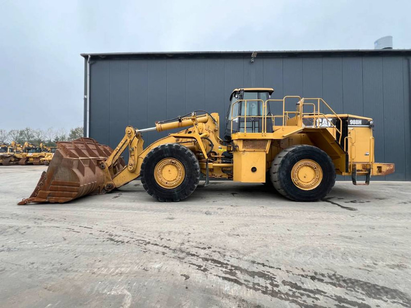 Cat 988H - Gumikerekes homlokrakodó: 5 kép. Cat 988H - Gumikerekes homlokrakodó: 5 kép.