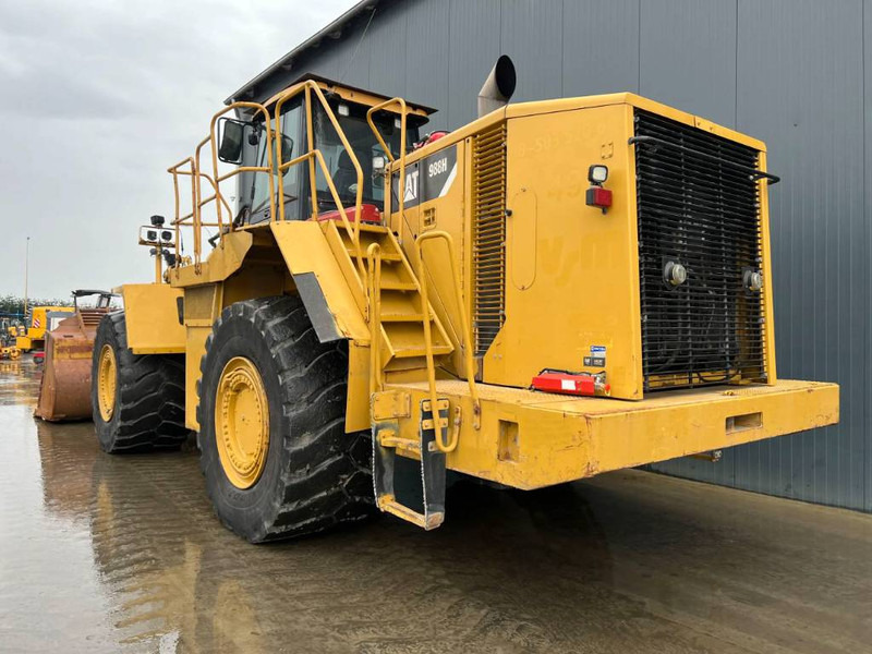 Cat 988H - Gumikerekes homlokrakodó: 2 kép. Cat 988H - Gumikerekes homlokrakodó: 2 kép.
