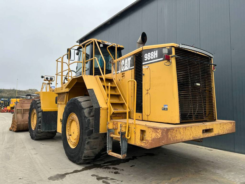 Cat 988H - Gumikerekes homlokrakodó: 2 kép. Cat 988H - Gumikerekes homlokrakodó: 2 kép.