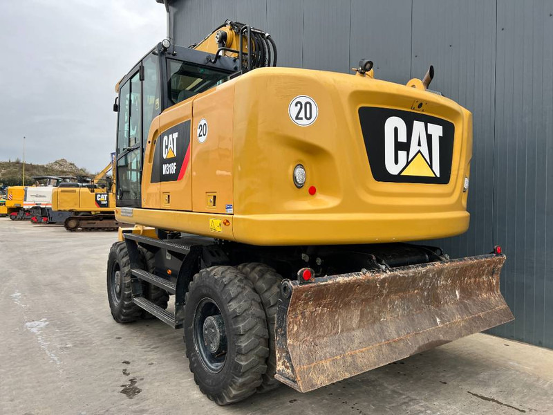 Cat M318F - Extremely Nice Condition - Gumikerekes kotró: 3 kép. Cat M318F - Extremely Nice Condition - Gumikerekes kotró: 3 kép.