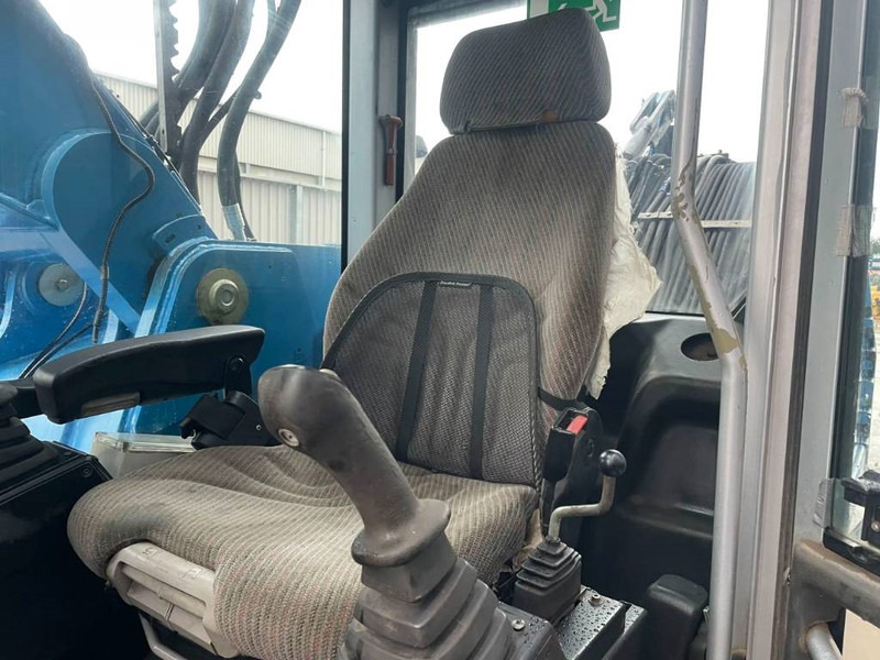 Hulladék kotró a következők szállításához hulladék Fuchs MHL350: 16 kép.