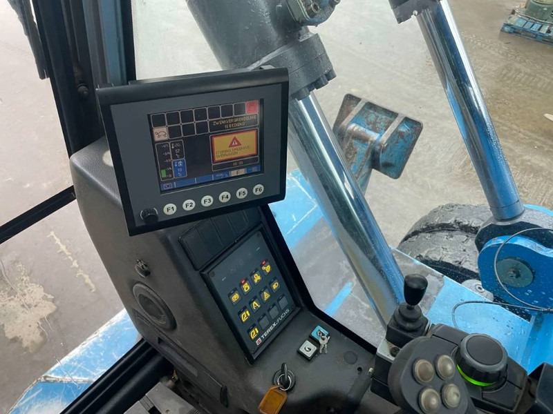 Hulladék kotró a következők szállításához hulladék Fuchs MHL350: 18 kép.