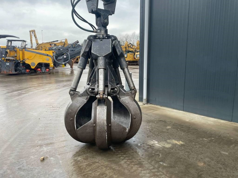 Hulladék kotró a következők szállításához hulladék Fuchs MHL350: 14 kép.