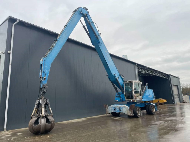 Fuchs MHL350 - Hulladék kotró: 2 kép. Fuchs MHL350 - Hulladék kotró: 2 kép.