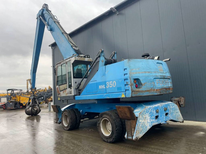 Fuchs MHL350 - Hulladék kotró: 3 kép. Fuchs MHL350 - Hulladék kotró: 3 kép.