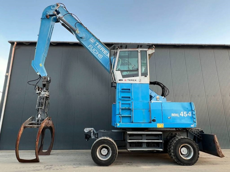 Fuchs MHL454 - Hulladék kotró: 5 kép. Fuchs MHL454 - Hulladék kotró: 5 kép.