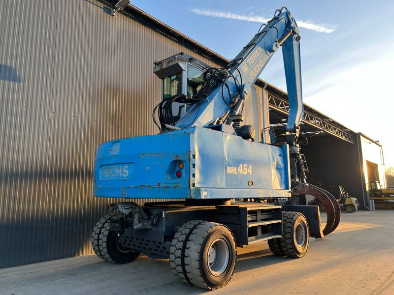 Fuchs MHL454 - Hulladék kotró: 4 kép. Fuchs MHL454 - Hulladék kotró: 4 kép.