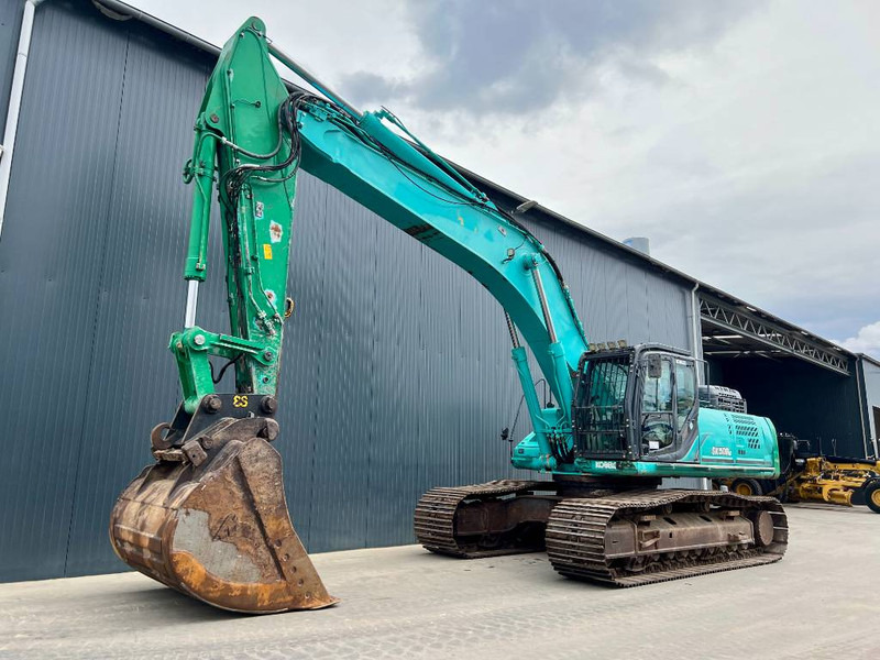 Kobelco SK500LC-9 - Lánctalpas kotró: 1 kép. Kobelco SK500LC-9 - Lánctalpas kotró: 1 kép.