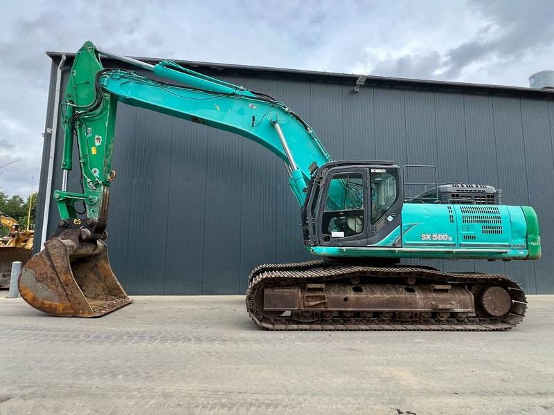 Kobelco SK500LC-9 - Lánctalpas kotró: 2 kép. Kobelco SK500LC-9 - Lánctalpas kotró: 2 kép.