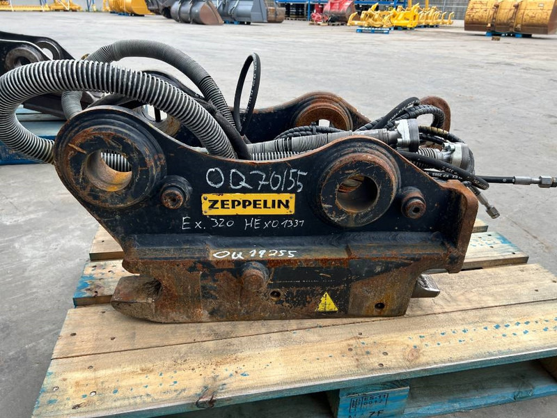 OilQuick OQ70/55 - 323F - Gyorscsatlakozó - Építőipari gépek: 4 kép. OilQuick OQ70/55 - 323F - Gyorscsatlakozó - Építőipari gépek: 4 kép.