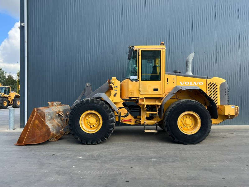 Volvo L60E - Gumikerekes homlokrakodó: 2 kép. Volvo L60E - Gumikerekes homlokrakodó: 2 kép.