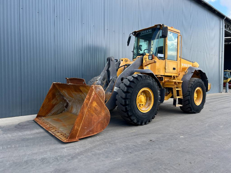 Volvo L60E - Gumikerekes homlokrakodó: 1 kép. Volvo L60E - Gumikerekes homlokrakodó: 1 kép.
