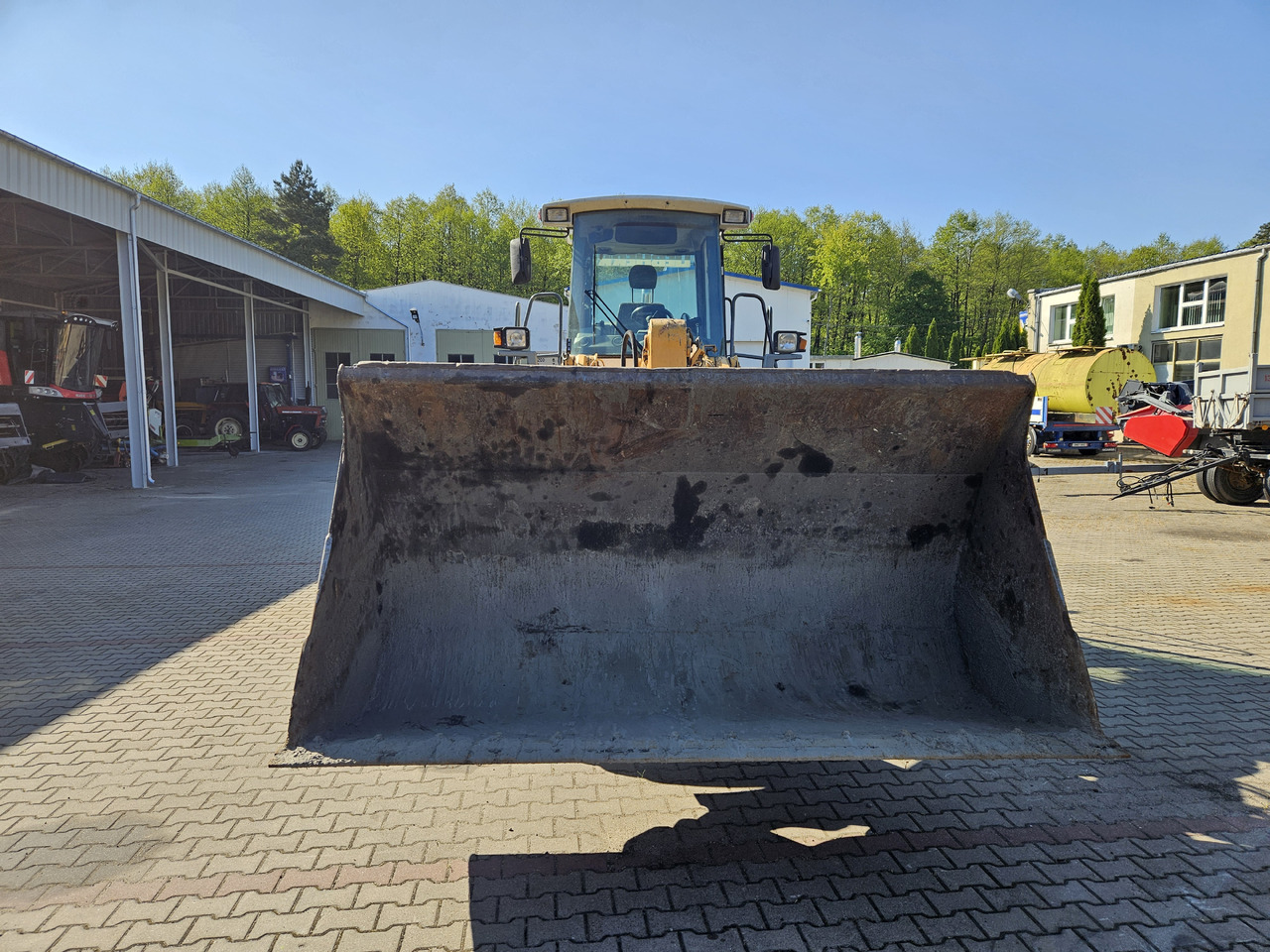 Liebherr L544 - Gumikerekes homlokrakodó: 2 kép. Liebherr L544 - Gumikerekes homlokrakodó: 2 kép.