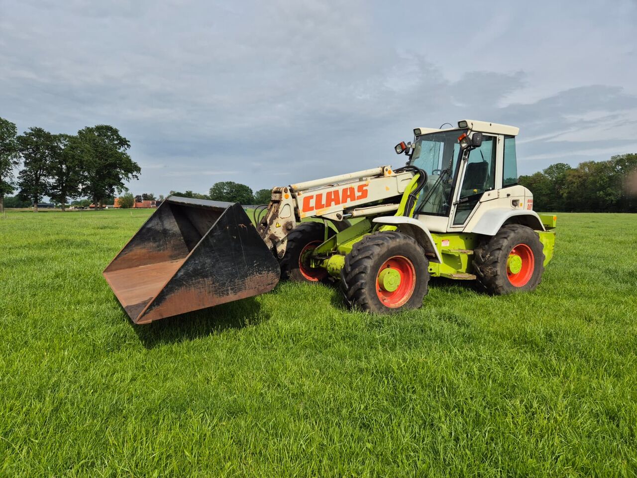 Claas Ranger 940 RX - Gumikerekes homlokrakodó: 1 kép. Claas Ranger 940 RX - Gumikerekes homlokrakodó: 1 kép.