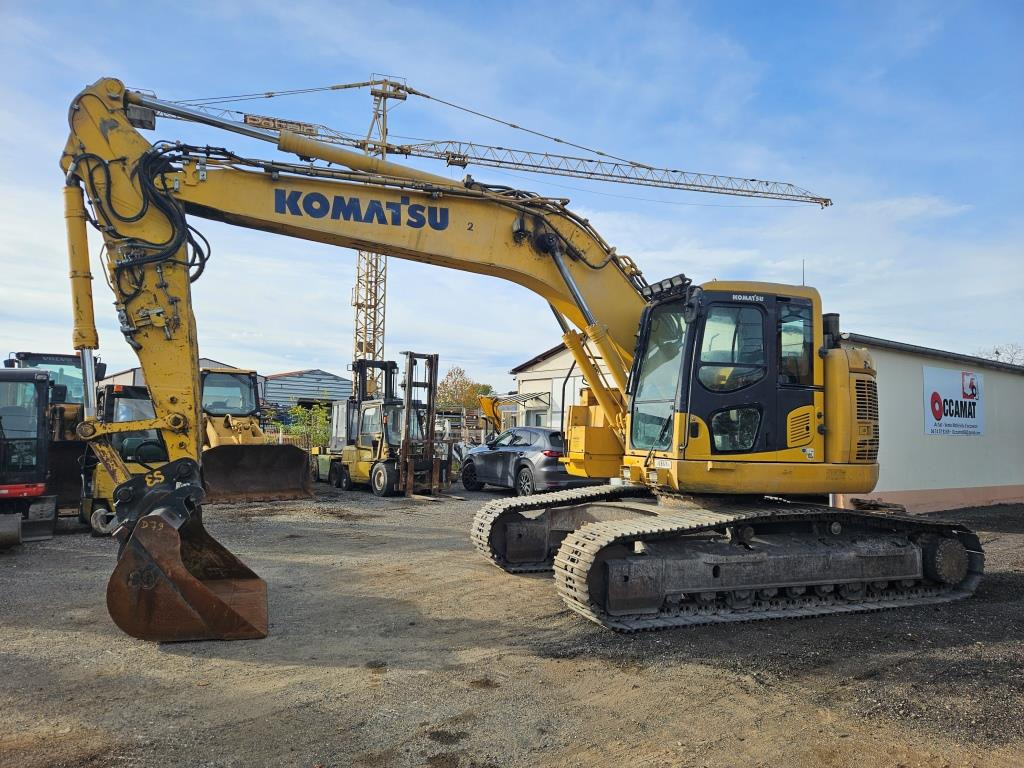 KOMATSU - Lánctalpas kotró: 2 kép. KOMATSU - Lánctalpas kotró: 2 kép.