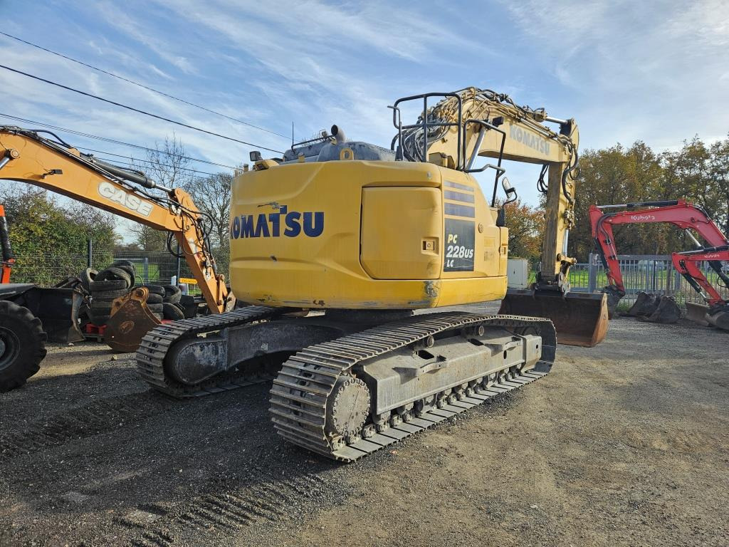 KOMATSU - Lánctalpas kotró: 5 kép. KOMATSU - Lánctalpas kotró: 5 kép.