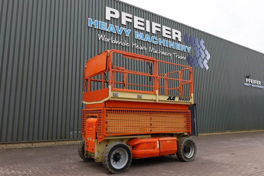 JLG M4069 Hybrid, 14.2m Working Height, 360kg Capacity - Ollós emelő: 1 kép. JLG M4069 Hybrid, 14.2m Working Height, 360kg Capacity - Ollós emelő: 1 kép.