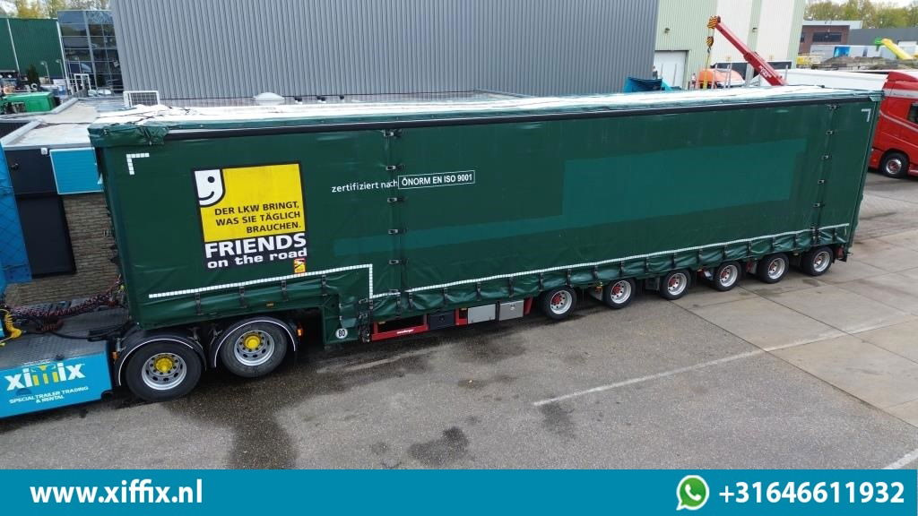 Meusburger 6-ass. Semi dieplader met elektische huifopbouw / 3x naloop gestuurd - Félpótkocsi mélybölcsős: 1 kép. Meusburger 6-ass. Semi dieplader met elektische huifopbouw / 3x naloop gestuurd - Félpótkocsi mélybölcsős: 1 kép.