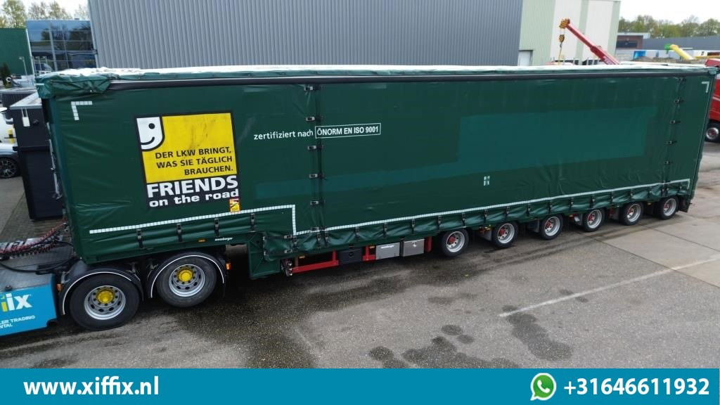 Meusburger 6-ass. Semi dieplader met elektrische huifopbouw / 3x naloop gestuurd - Félpótkocsi mélybölcsős: 1 kép. Meusburger 6-ass. Semi dieplader met elektrische huifopbouw / 3x naloop gestuurd - Félpótkocsi mélybölcsős: 1 kép.