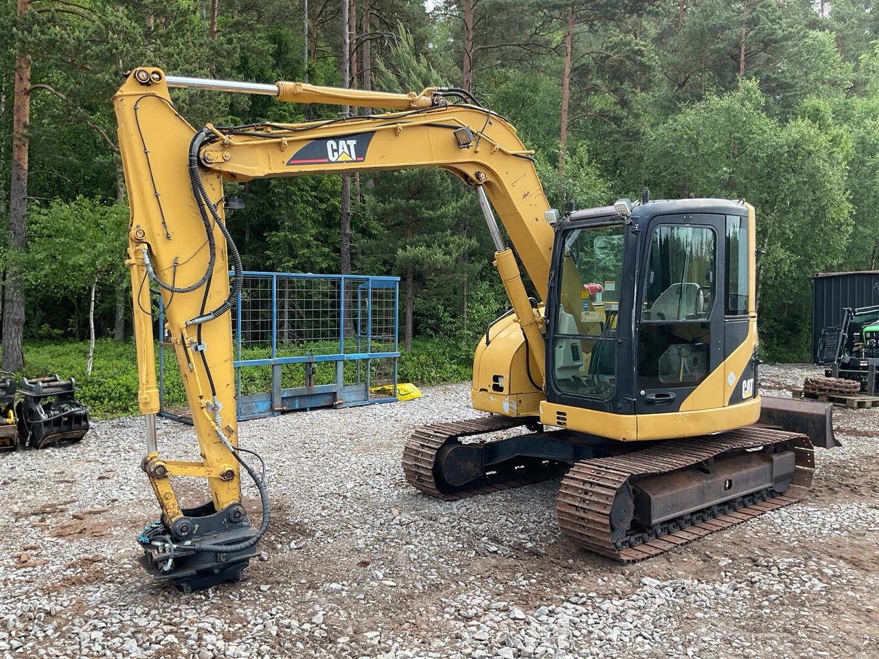 CAT 308C CR - Kotrógép: 1 kép. CAT 308C CR - Kotrógép: 1 kép.