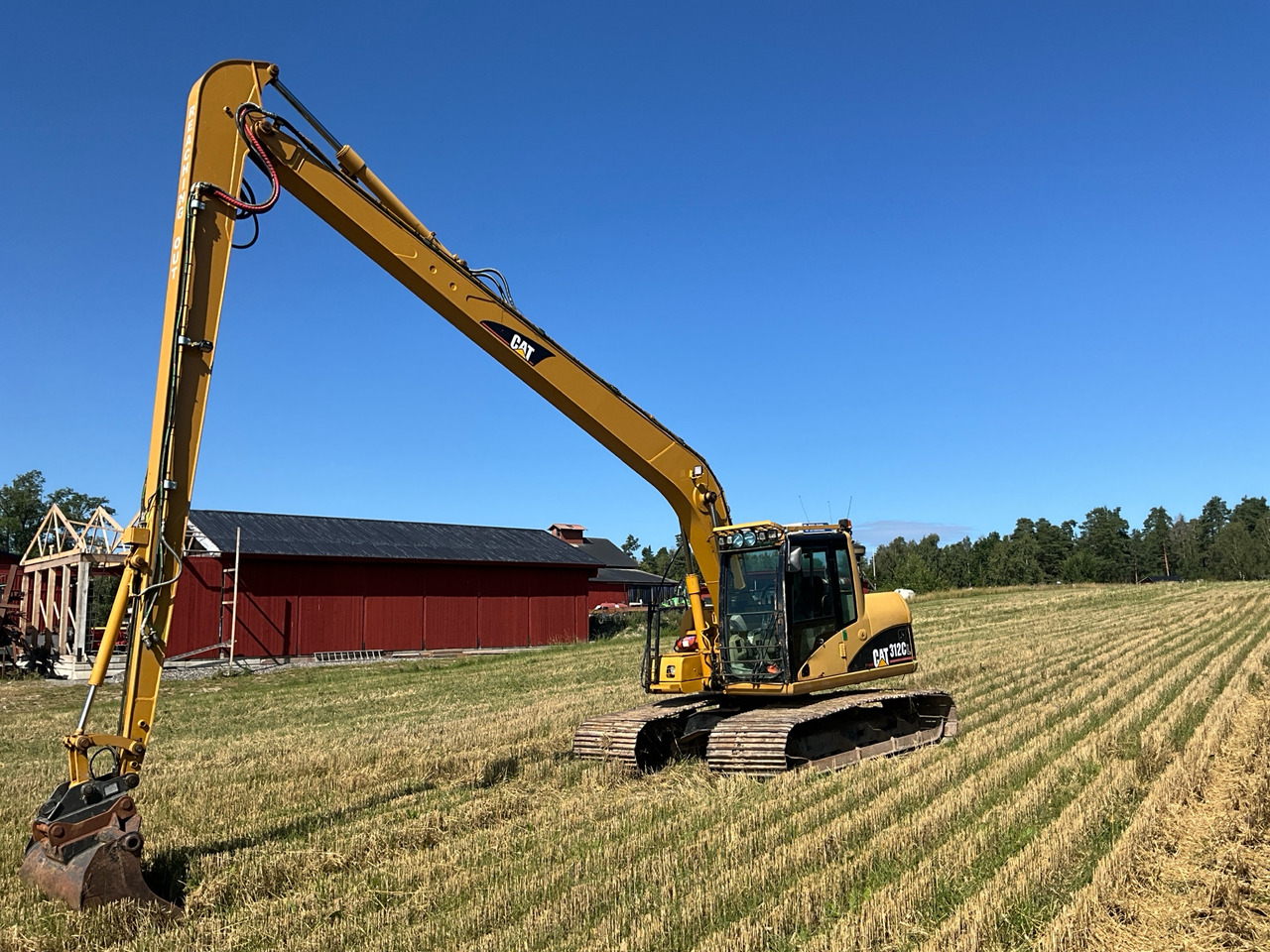 CAT 312C L - Kotrógép: 1 kép. CAT 312C L - Kotrógép: 1 kép.