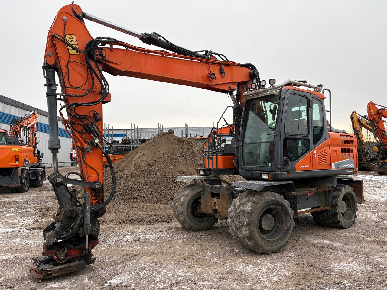 Doosan DX170 W-5 - Kotrógép: 1 kép. Doosan DX170 W-5 - Kotrógép: 1 kép.