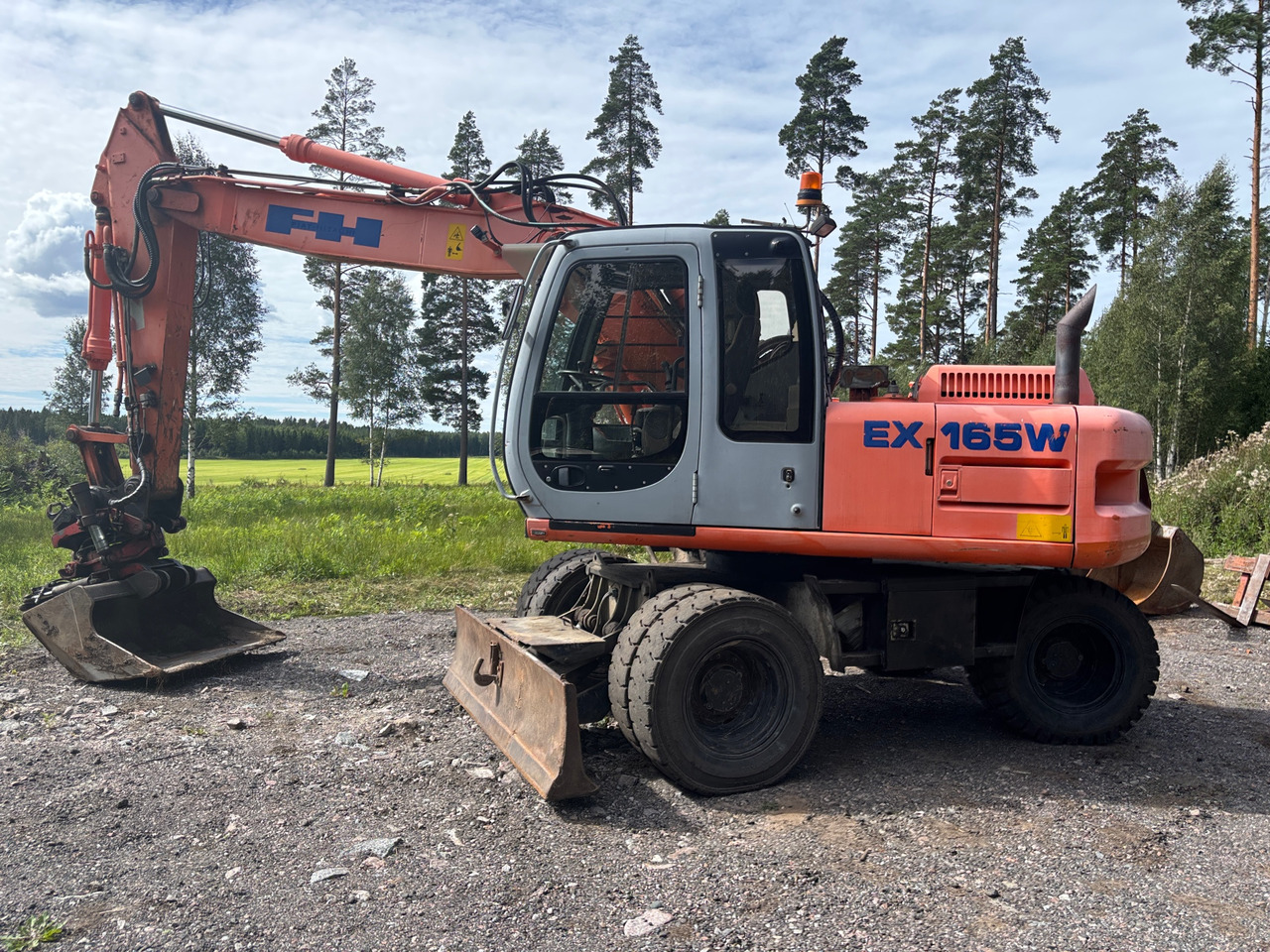 Hitachi EX 165W - Kotrógép: 1 kép. Hitachi EX 165W - Kotrógép: 1 kép.