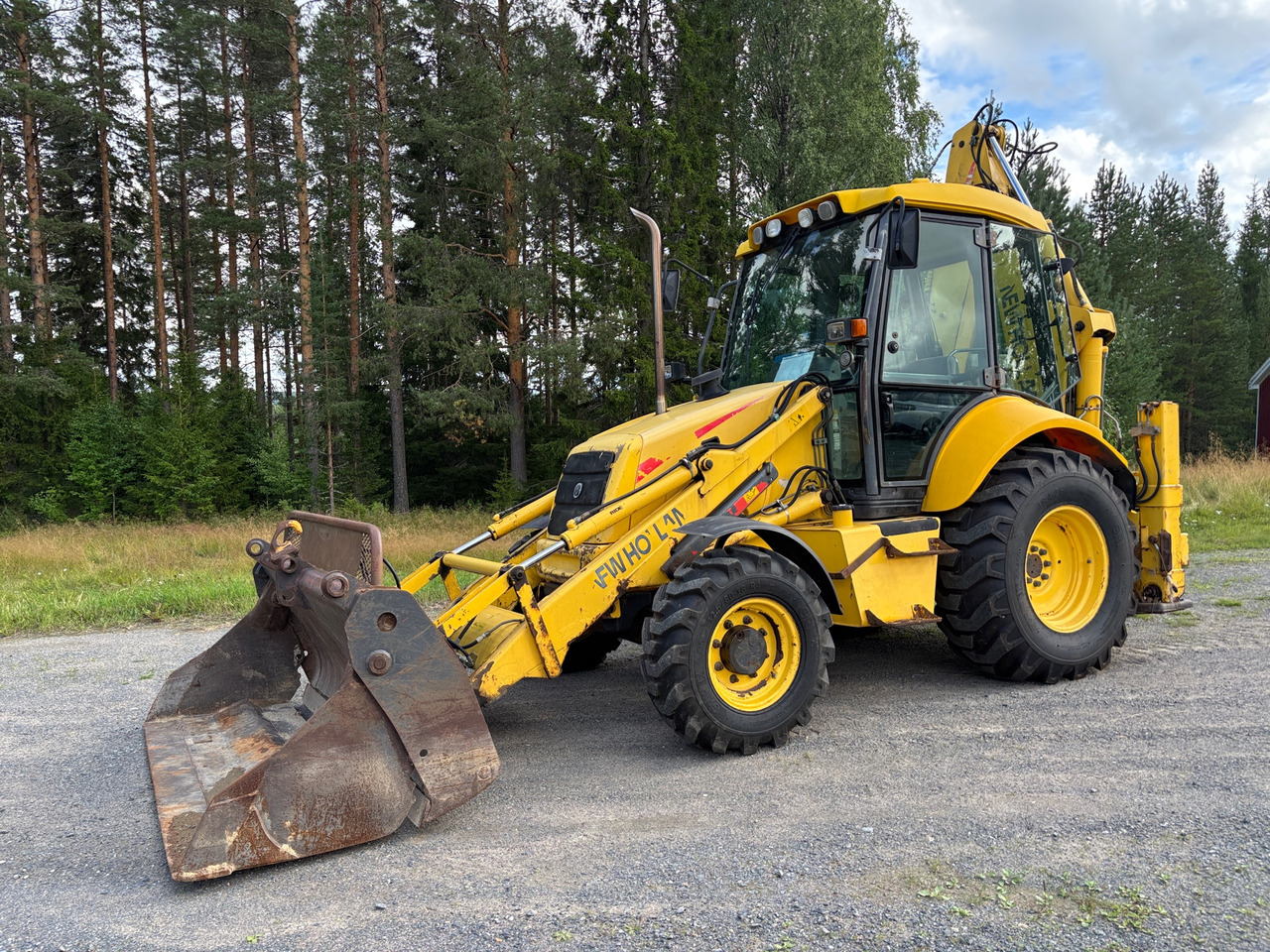 New Holland LB 110 - Kotrórakodó: 1 kép. New Holland LB 110 - Kotrórakodó: 1 kép.