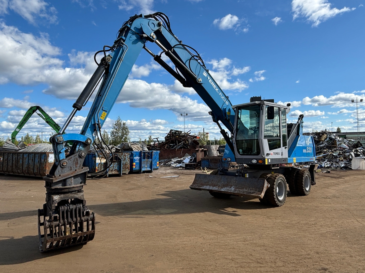 Terex Fuchs MHL320 - Építőipari berendezések: 1 kép. Terex Fuchs MHL320 - Építőipari berendezések: 1 kép.