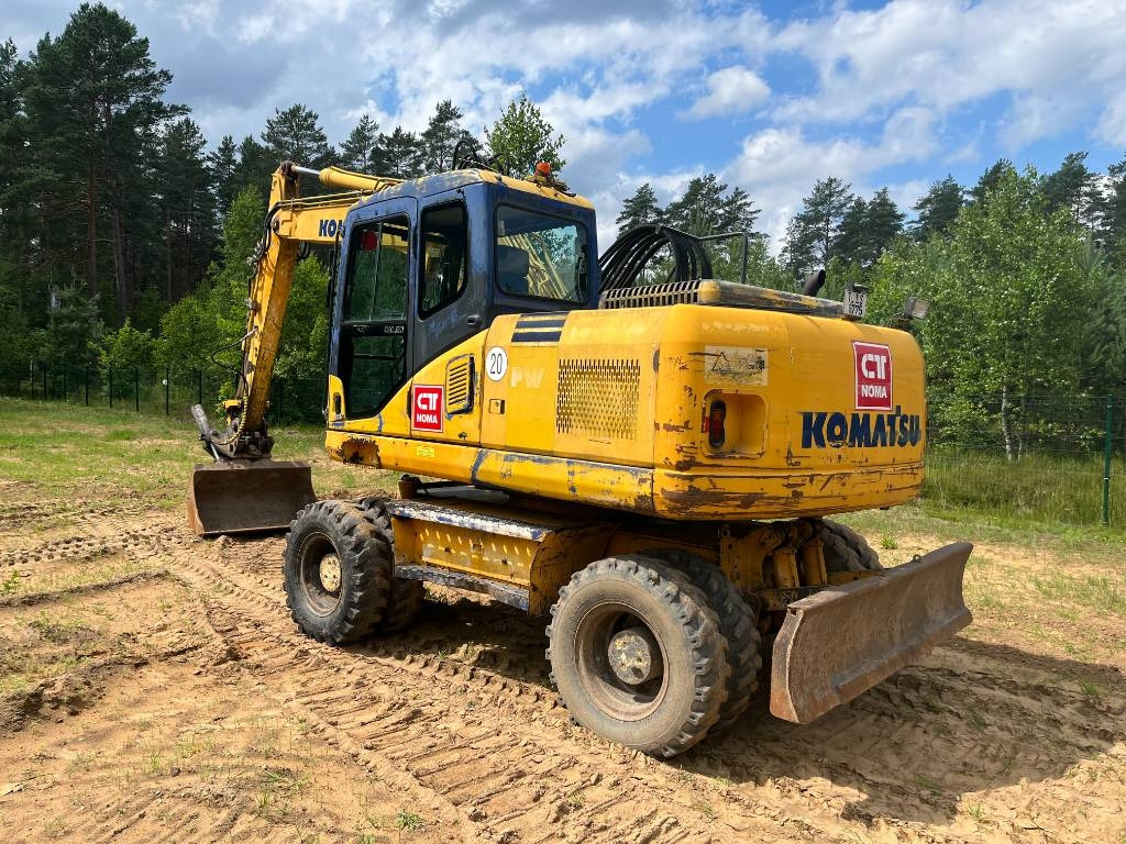 Komatsu PW 160 ES-7K - Gumikerekes kotró: 4 kép. Komatsu PW 160 ES-7K - Gumikerekes kotró: 4 kép.