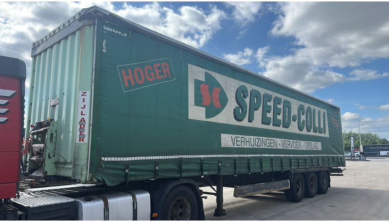 Krone SDP27 (BPW AXLES / DISC BRAKES / BELGIAN TRAILER / GOOD TYRES) - Ponyvás félpótkocsi: 1 kép. Krone SDP27 (BPW AXLES / DISC BRAKES / BELGIAN TRAILER / GOOD TYRES) - Ponyvás félpótkocsi: 1 kép.