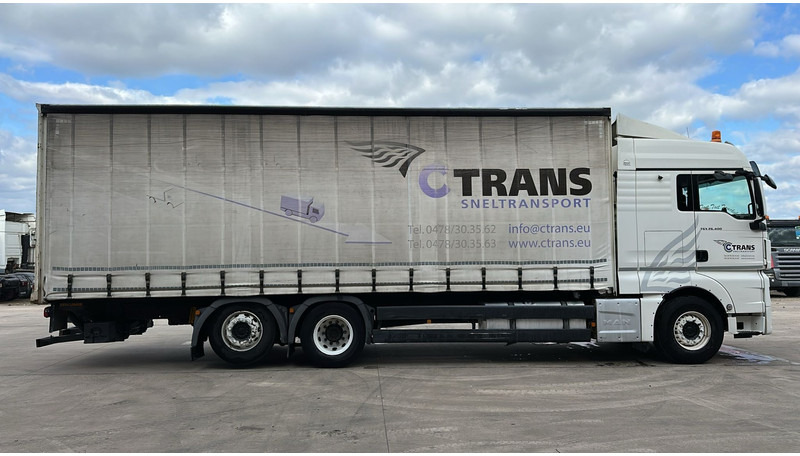 MAN TGX 26.400 (EURO 6 / 6X2 / LIFT / HAYON / BELGIAN TRUCK / GUTE ZUSTAND !! / 8.40 BOX LENGTH) - Ponyvás teherautó: 4 kép. MAN TGX 26.400 (EURO 6 / 6X2 / LIFT / HAYON / BELGIAN TRUCK / GUTE ZUSTAND !! / 8.40 BOX LENGTH) - Ponyvás teherautó: 4 kép.