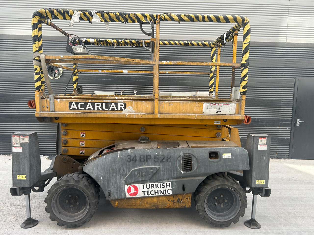 HAULOTTE Compact 12 - Ollós emelő: 1 kép. HAULOTTE Compact 12 - Ollós emelő: 1 kép.