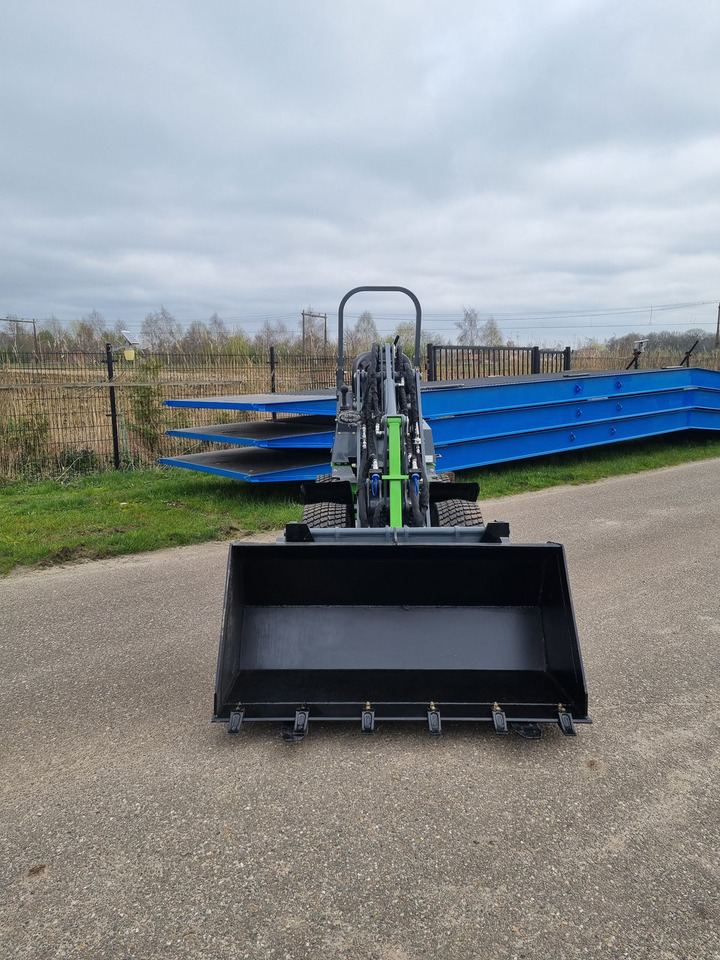 Gumikerekes homlokrakodó WCM -L1460 shovel met beugel: 7 kép.