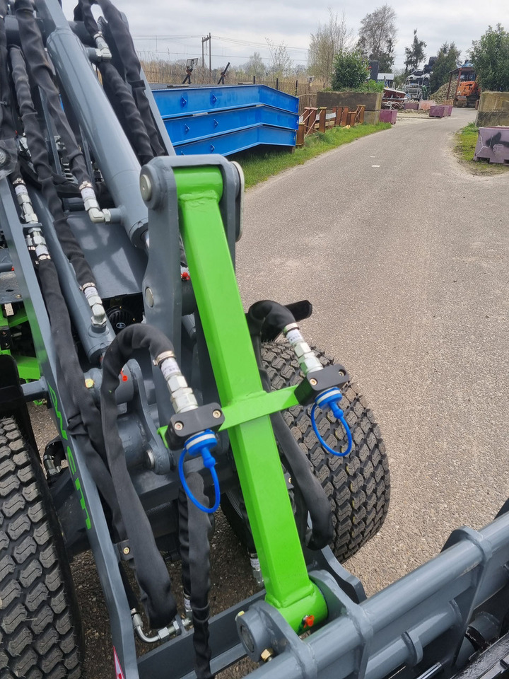 Gumikerekes homlokrakodó WCM -L1460 shovel met beugel: 11 kép.