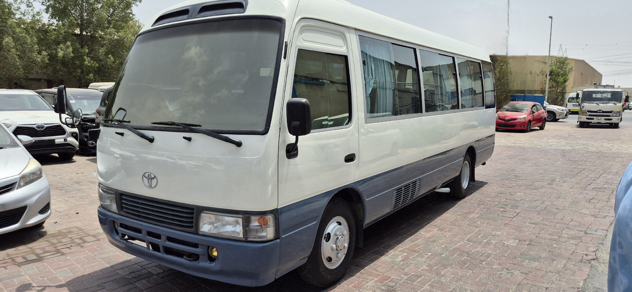 Toyota Coaster ... 30 places - climatisé - Minibusz, Kisbusz: 1 kép. Toyota Coaster ... 30 places - climatisé - Minibusz, Kisbusz: 1 kép.