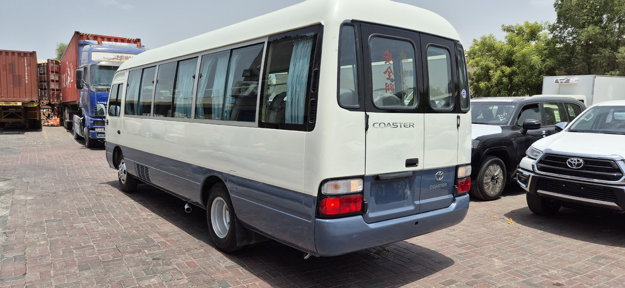 Toyota Coaster ... 30 places - climatisé - Minibusz, Kisbusz: 2 kép. Toyota Coaster ... 30 places - climatisé - Minibusz, Kisbusz: 2 kép.