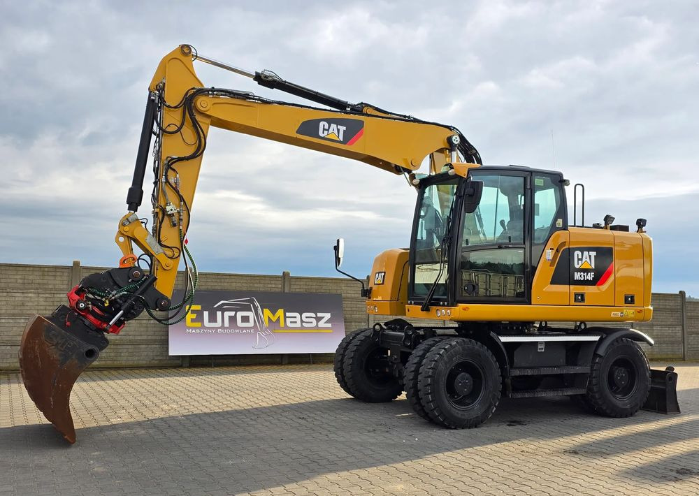 Caterpillar M314F, 2016 ROK, GŁOWICA ROTOTILT, 4400 MTH - Gumikerekes kotró: 2 kép. Caterpillar M314F, 2016 ROK, GŁOWICA ROTOTILT, 4400 MTH - Gumikerekes kotró: 2 kép.