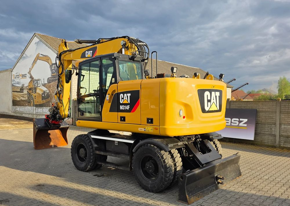 Caterpillar M314F, 2016 ROK, GŁOWICA ROTOTILT, 4400 MTH - Gumikerekes kotró: 4 kép. Caterpillar M314F, 2016 ROK, GŁOWICA ROTOTILT, 4400 MTH - Gumikerekes kotró: 4 kép.