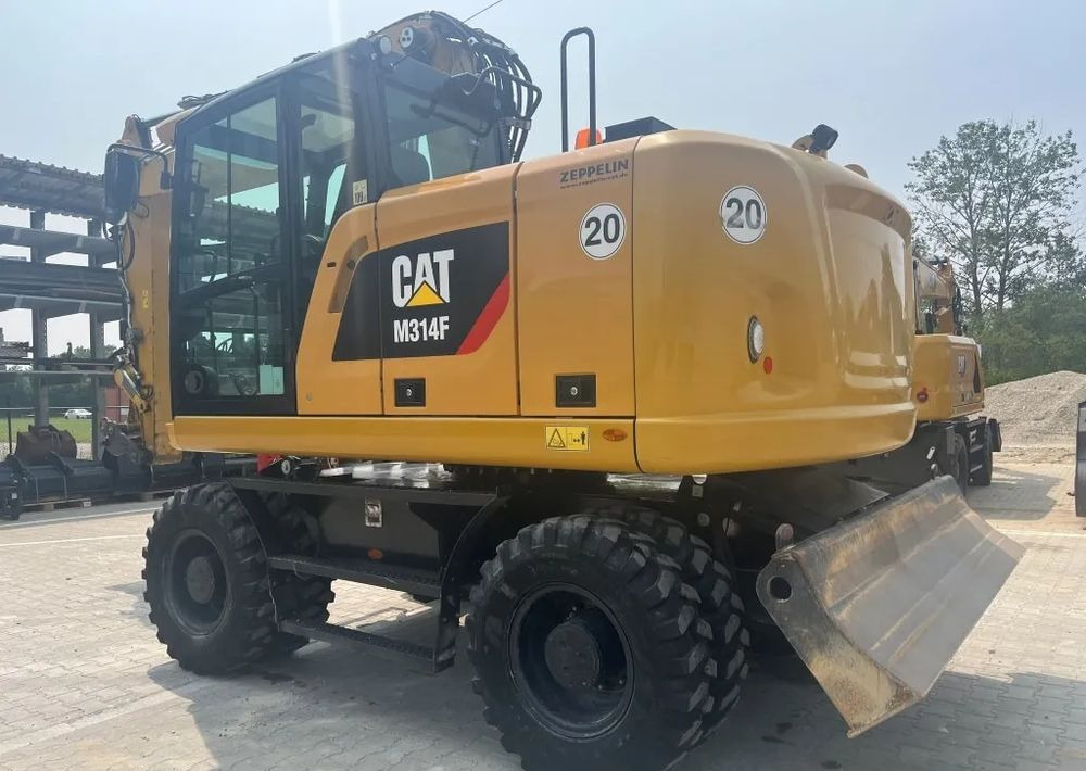 Caterpillar M314F, 2016 ROK, TYLKO 3300 MTH ! ! ! - Gumikerekes kotró: 2 kép. Caterpillar M314F, 2016 ROK, TYLKO 3300 MTH ! ! ! - Gumikerekes kotró: 2 kép.
