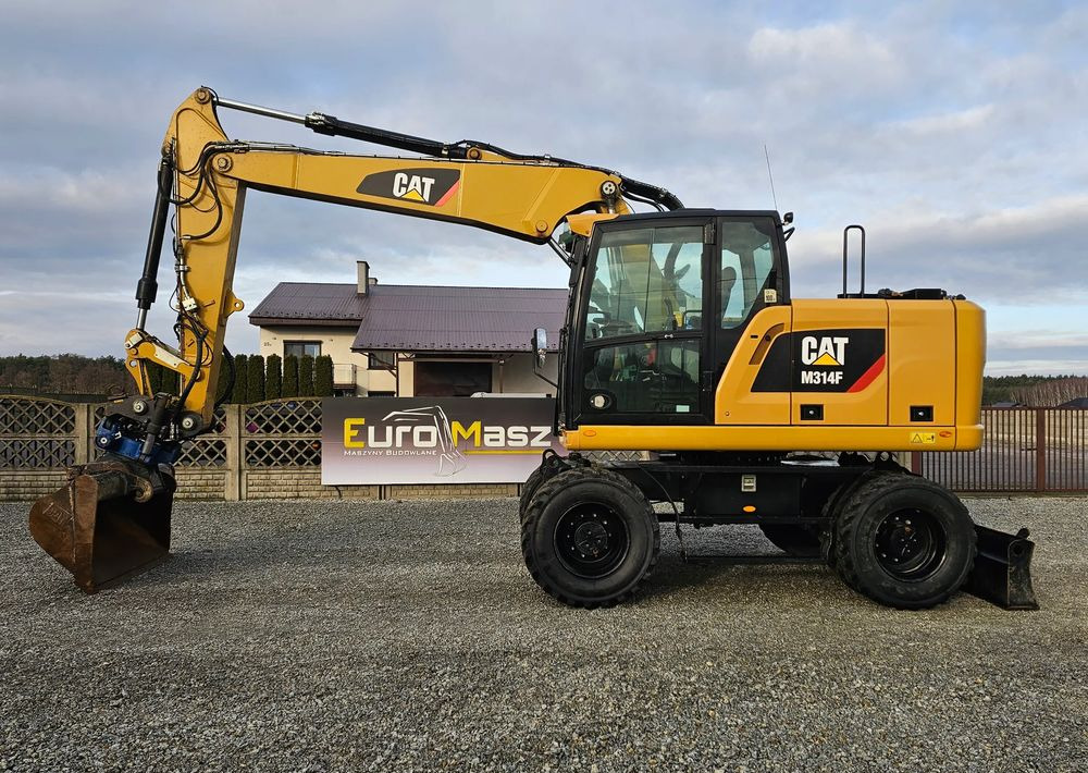 Caterpillar M314F, 2019 ROK, 5600 MTH, GŁOWICA SMP - Gumikerekes kotró: 4 kép. Caterpillar M314F, 2019 ROK, 5600 MTH, GŁOWICA SMP - Gumikerekes kotró: 4 kép.