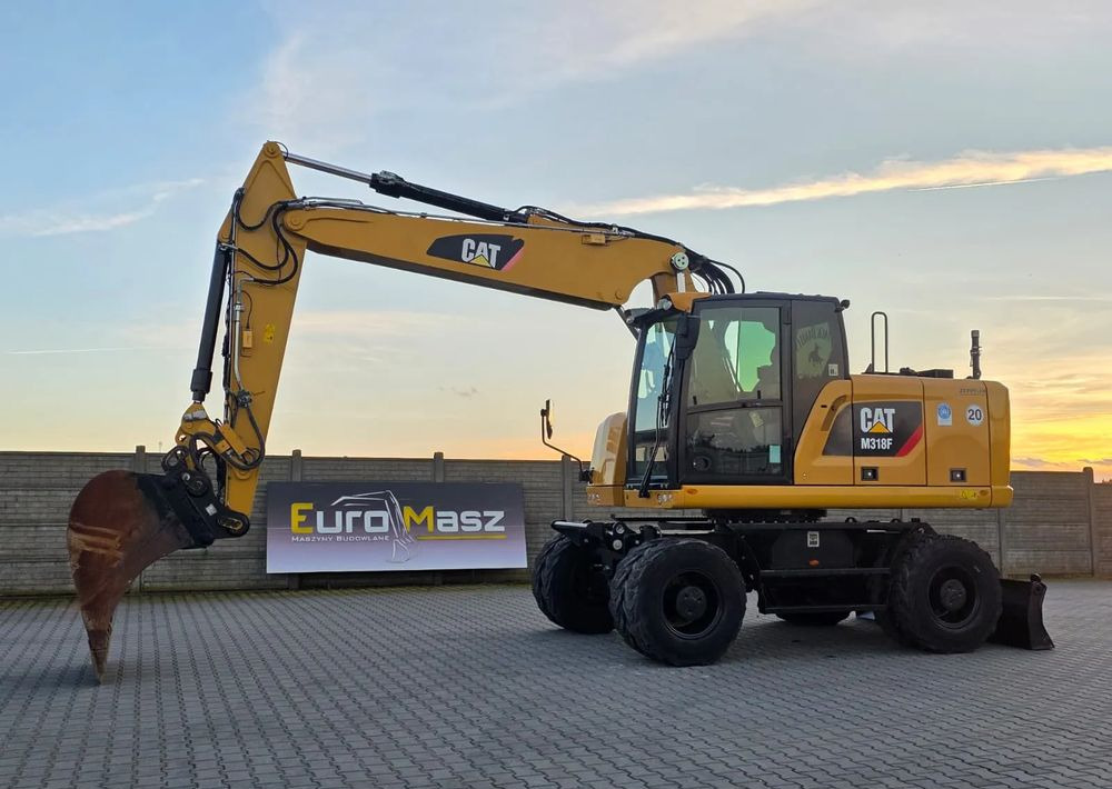 Caterpillar M318F, 2019 ROK, IMPORT NIEMCY - Gumikerekes kotró: 1 kép. Caterpillar M318F, 2019 ROK, IMPORT NIEMCY - Gumikerekes kotró: 1 kép.